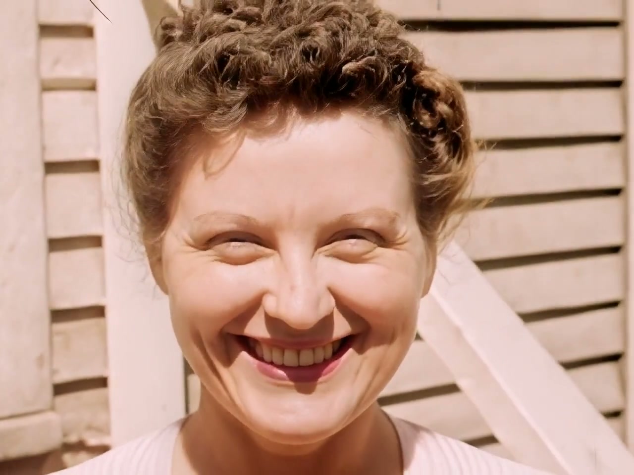 A restored face, sharp and detailed, in color